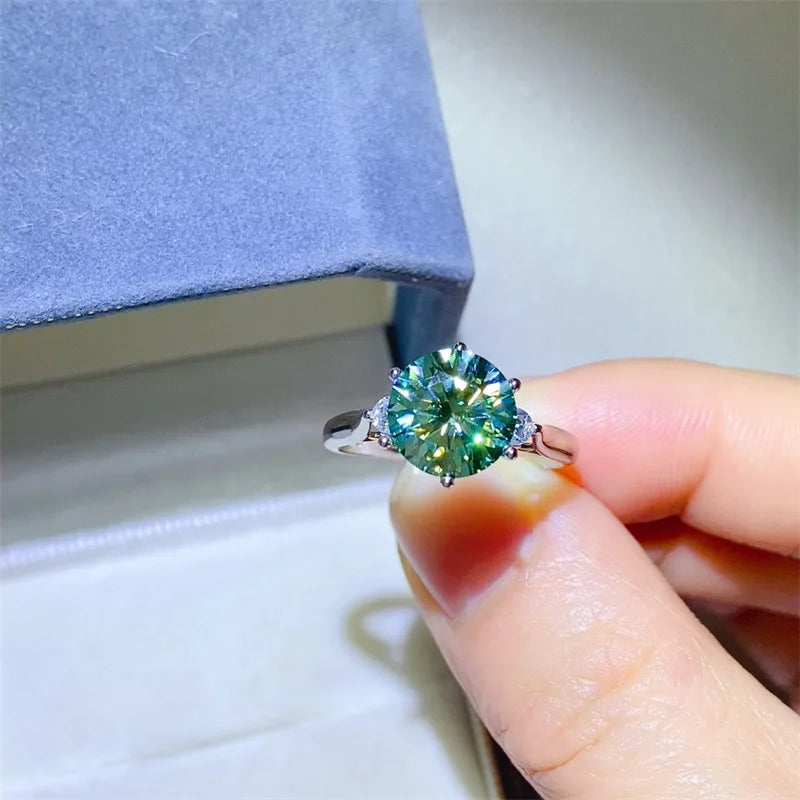Solid 18K white platinum luxury moissanite ring with intricate band design, showcasing brilliance and craftsmanship.