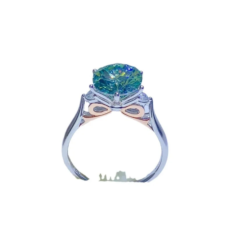 Elegant 18K solid platinum luxury moissanite ring with a 2.2-carat center stone, showcasing intricate design and high-quality craftsmanship.