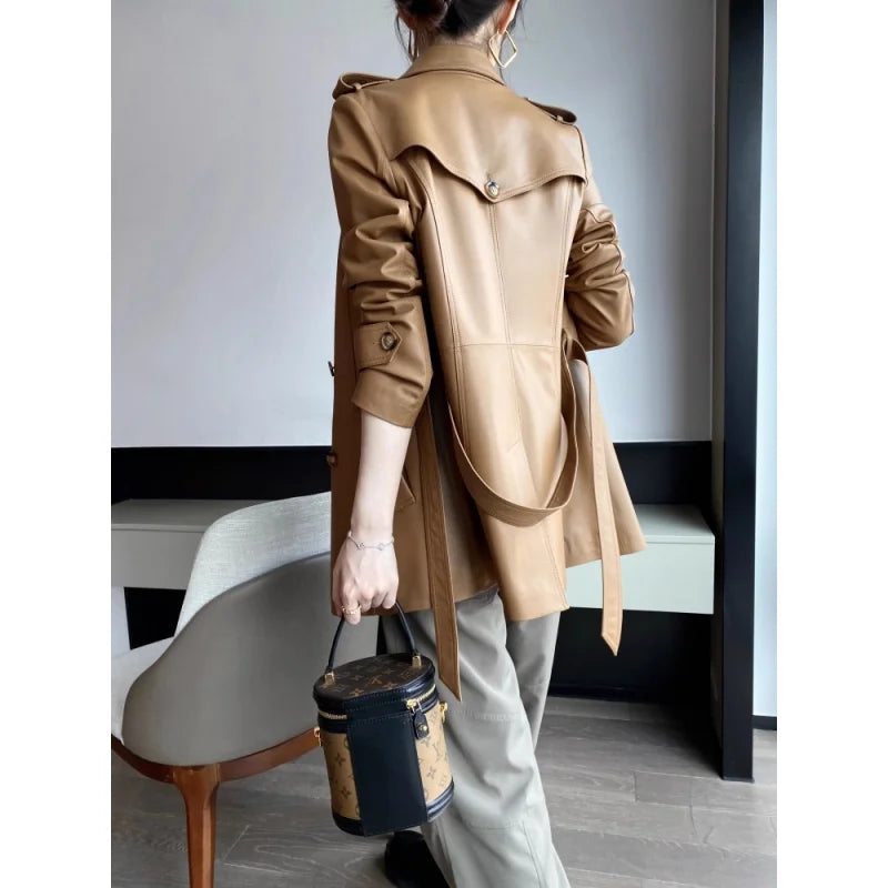 Genuine leather women's jacket by Corporación Turística, stylish warm outerwear with a fitted design and classic black color.