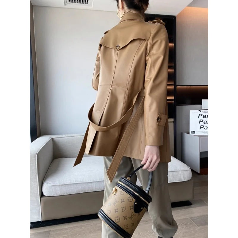 Genuine leather women's jacket by Corporación Turística, stylish warm outerwear with a classic fit and smooth leather surface.