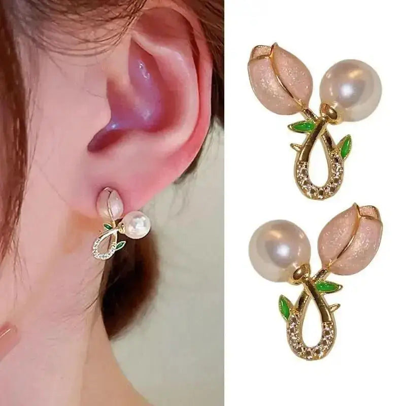 Silver 92% crystal hollow swan earrings with needle design, featuring elegant green crystal accents for a sophisticated look.