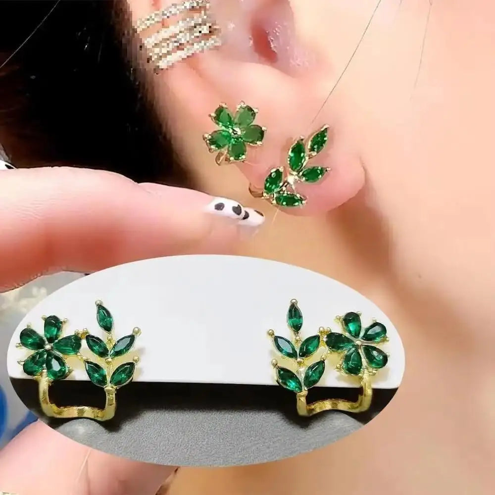Silver 92% crystal hollow swan earrings with needle design, featuring elegant green crystal accents.
