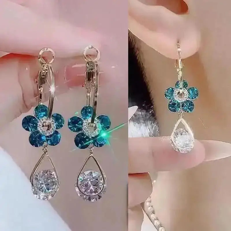 Purple crystal heart drop earrings for women, featuring elegant gemstone design by Corporación Turística.