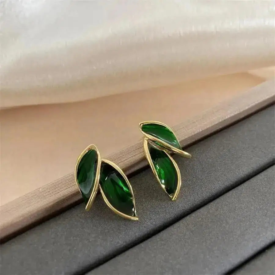 Purple crystal heart drop earrings for women, featuring elegant teardrop design by Corporación Turística.