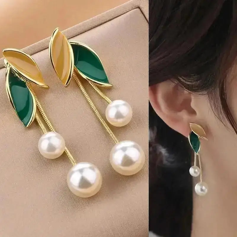 Korean fashion pearl tassel earrings with needle hook, featuring 5mm crystal beads and stylish design from Corporación Turística.