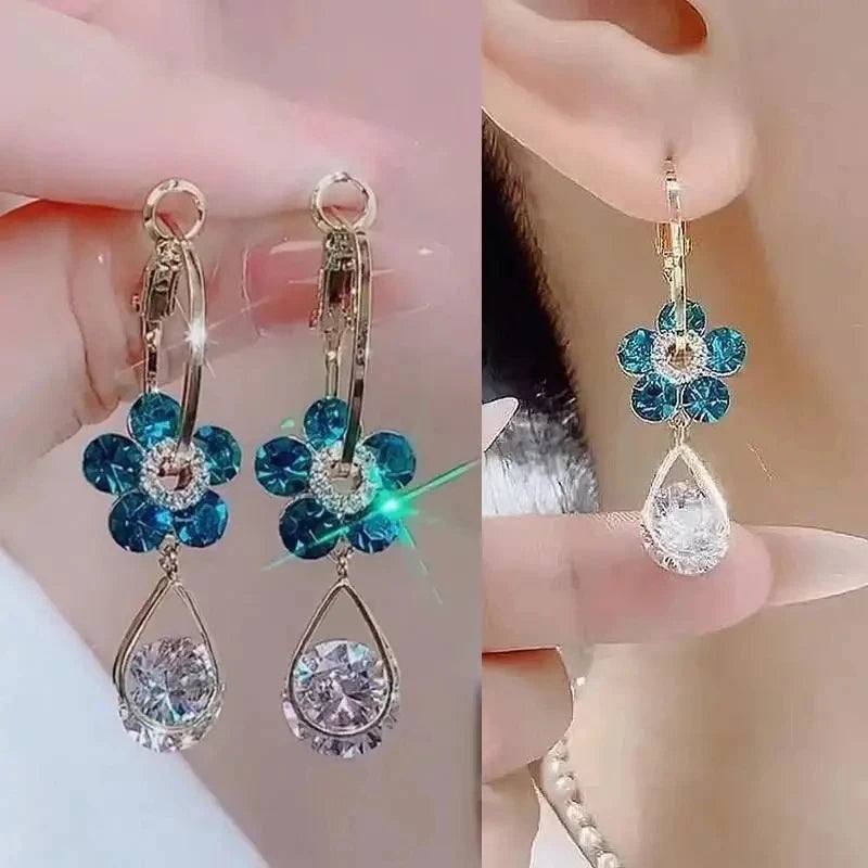 Korean fashion pearl tassel earrings with needle, featuring white pearls and gold accents, stylish jewelry for women.