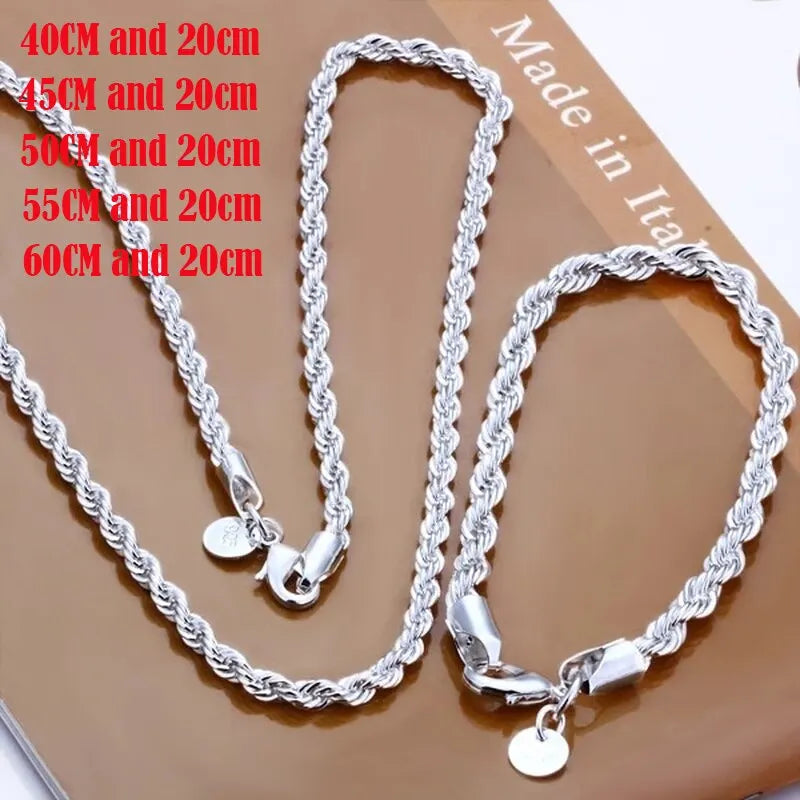 Silver 4mm men's braided rope chain necklace, 55cm and 20cm lengths, from Corporación Turística, displayed on a plain background.