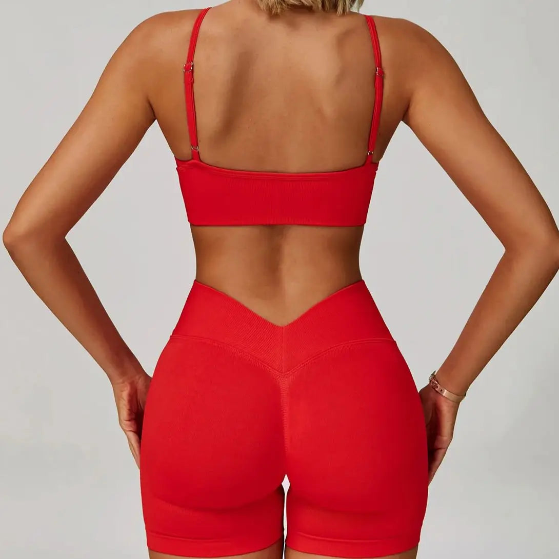 Black seamless 2/3-piece sports yoga set by Corporación Turística, includes fitted top and leggings for active wear.