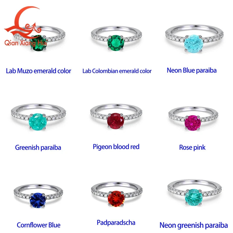 Silver ring with a 6.5mm neon blue-green Paraiba tourmaline and YAG gemstone, showcasing vibrant colors and intricate design.