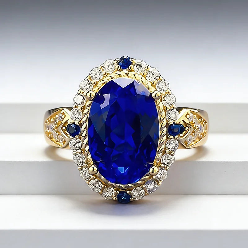 Luxury 24K gold solid ring with certificate, featuring a blue gemstone setting, crafted by Corporación Turística.