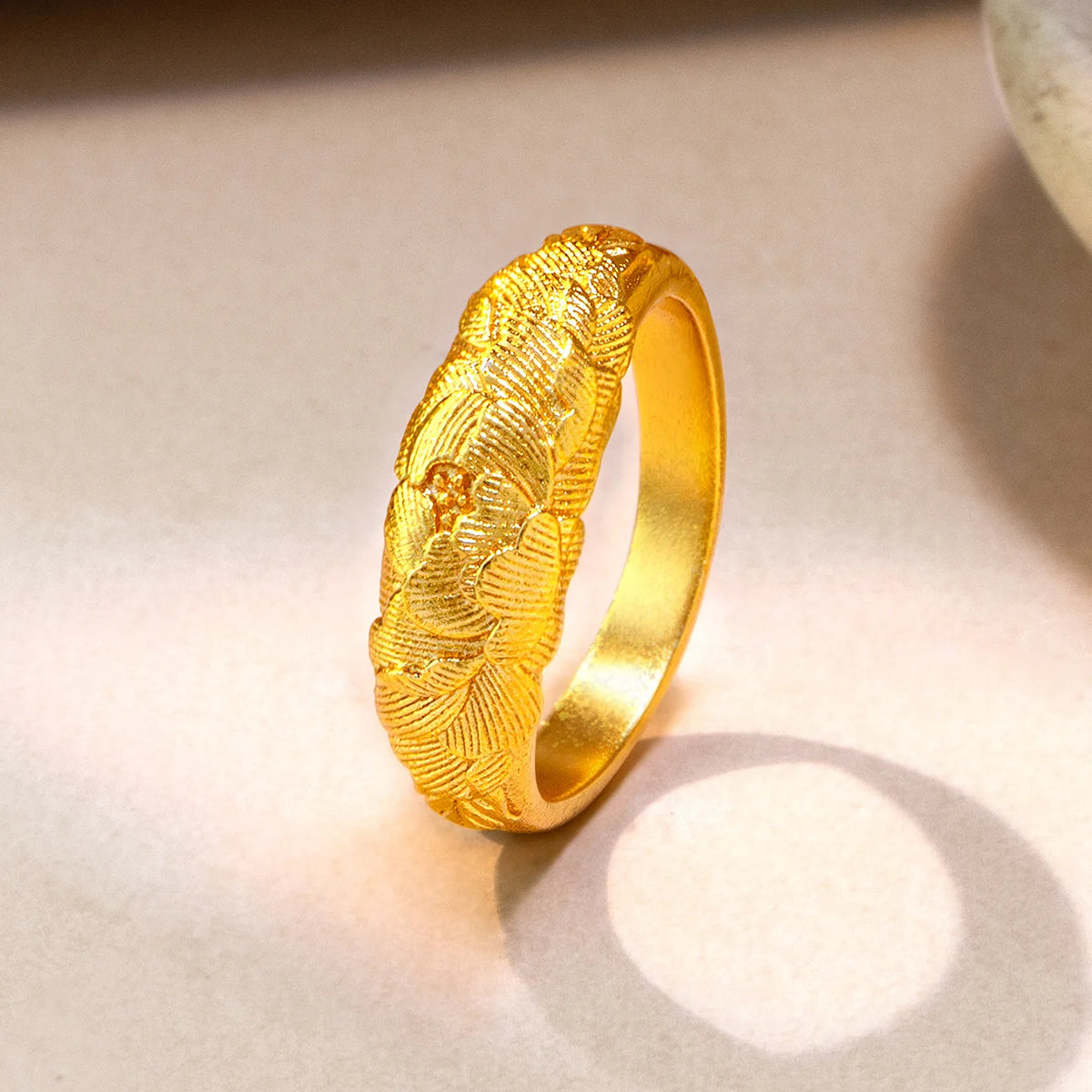 Gold solid ring with intricate peony relief design for women, featuring detailed floral craftsmanship.