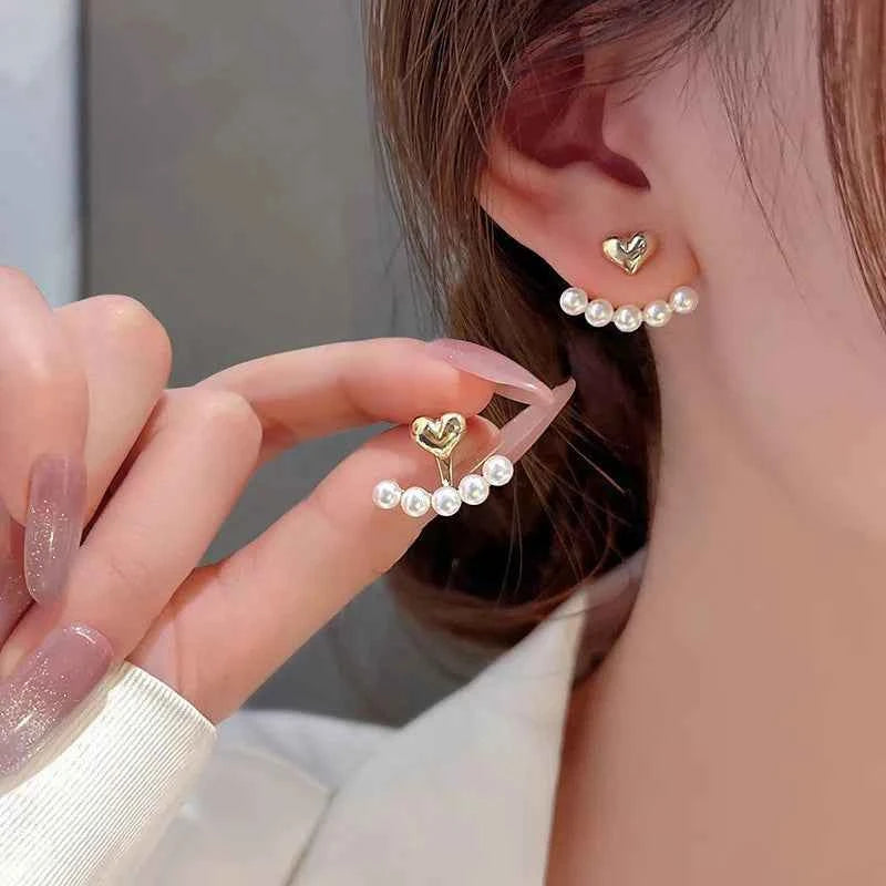 Elegant gold WUKALO 2024 earrings featuring a stylish design, perfect for adding a sophisticated touch to any outfit.
