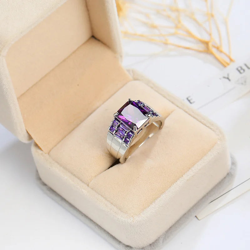 Wide purple cubic zirconia ring for women, showcasing sparkling stones and a bold, stylish design from Corporación Turística.