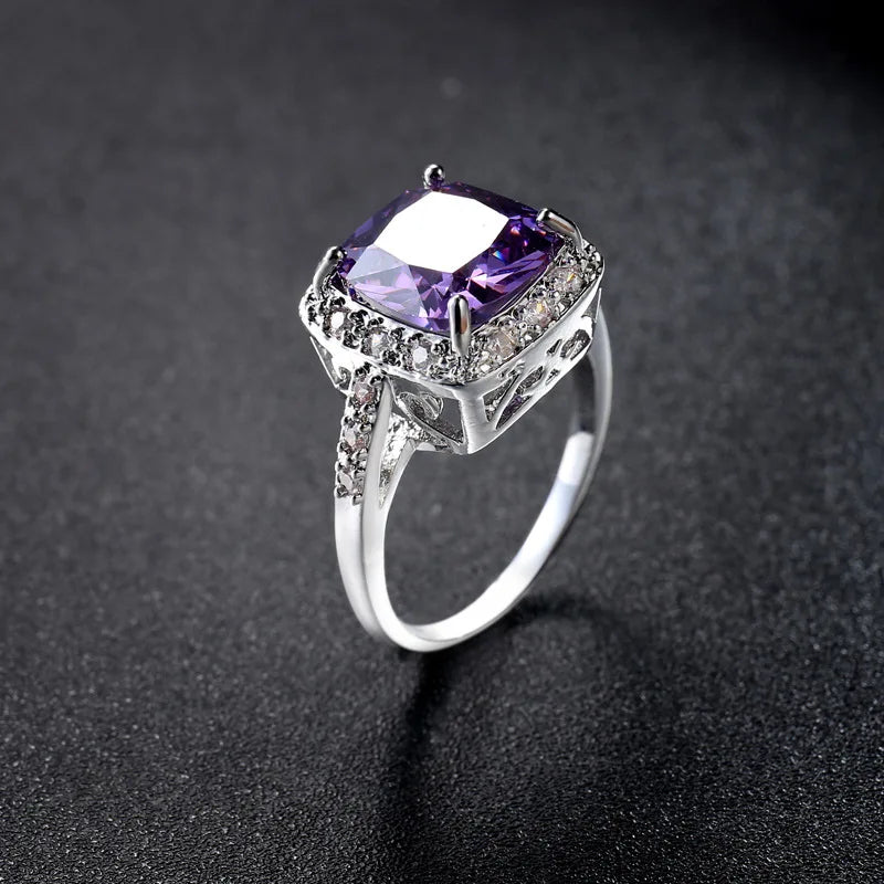 Elegant female fashion rings in 925 sterling silver, featuring stylish designs with polished finish and intricate detailing.
