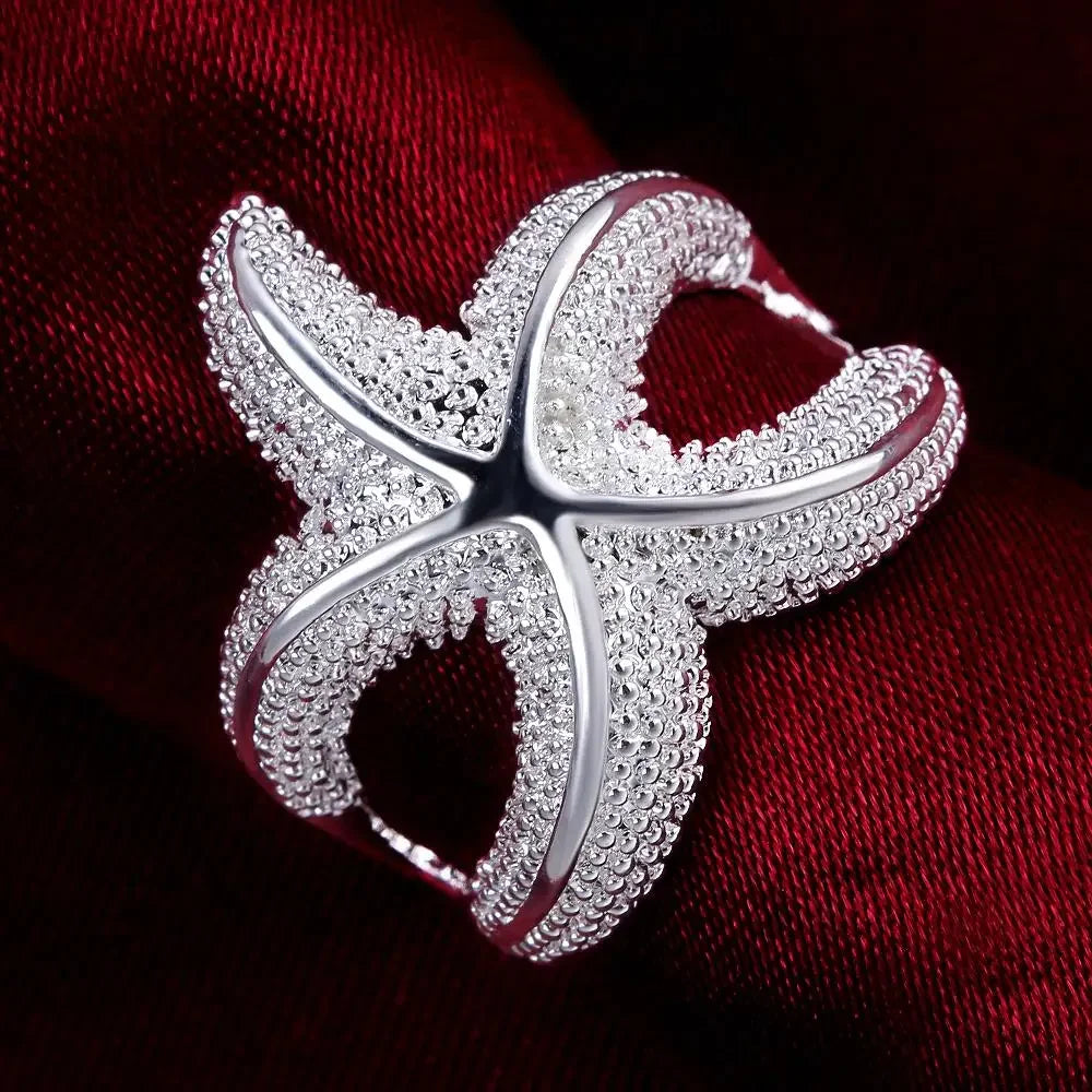 Large sterling silver starfish rings with fine detailing, perfect for beach-inspired jewelry styles.