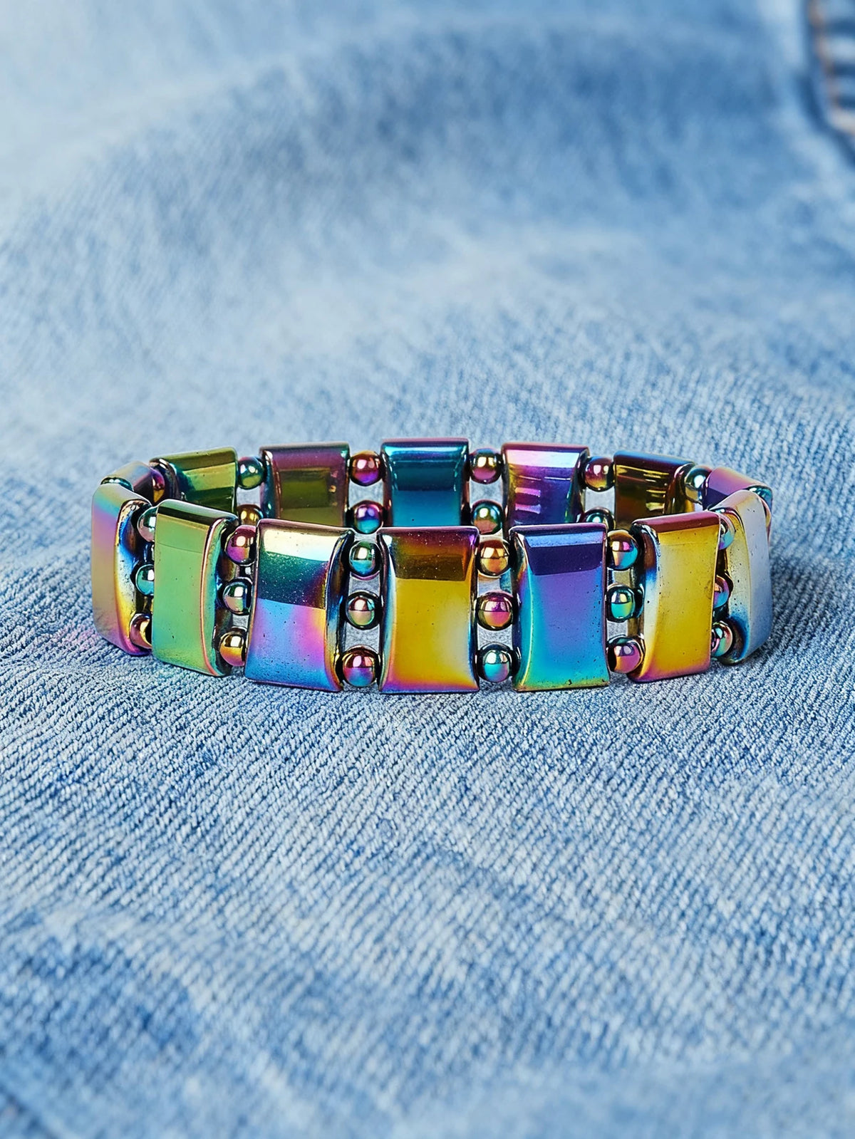 Natural hematite stone bracelet with rectangular beads on a 19cm (7.5 inch) stretch cord, showcasing polished metallic gray stones.