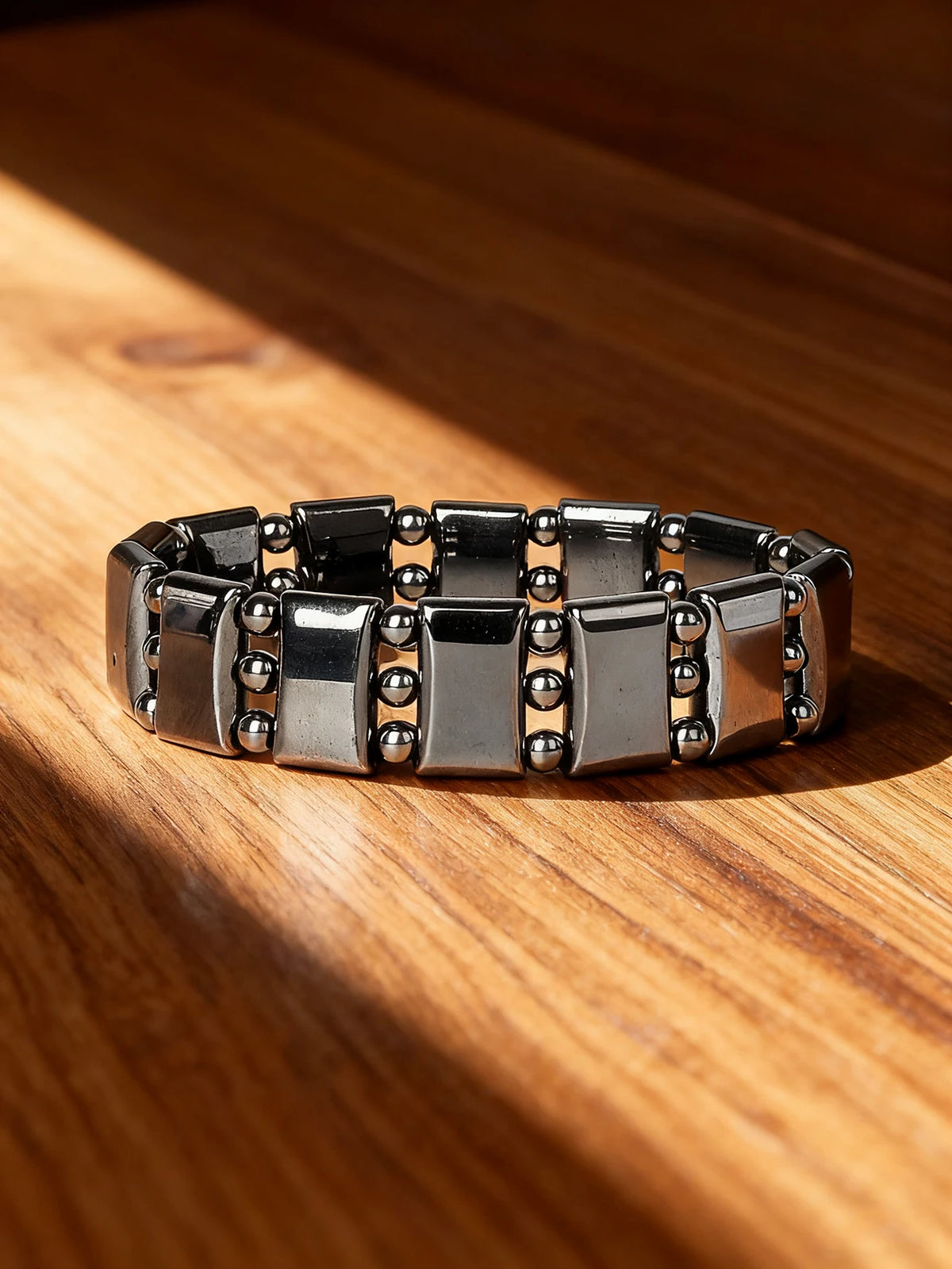 Hematite beaded bracelet with rectangular natural stone beads, 19cm length, from Corporación Turística.