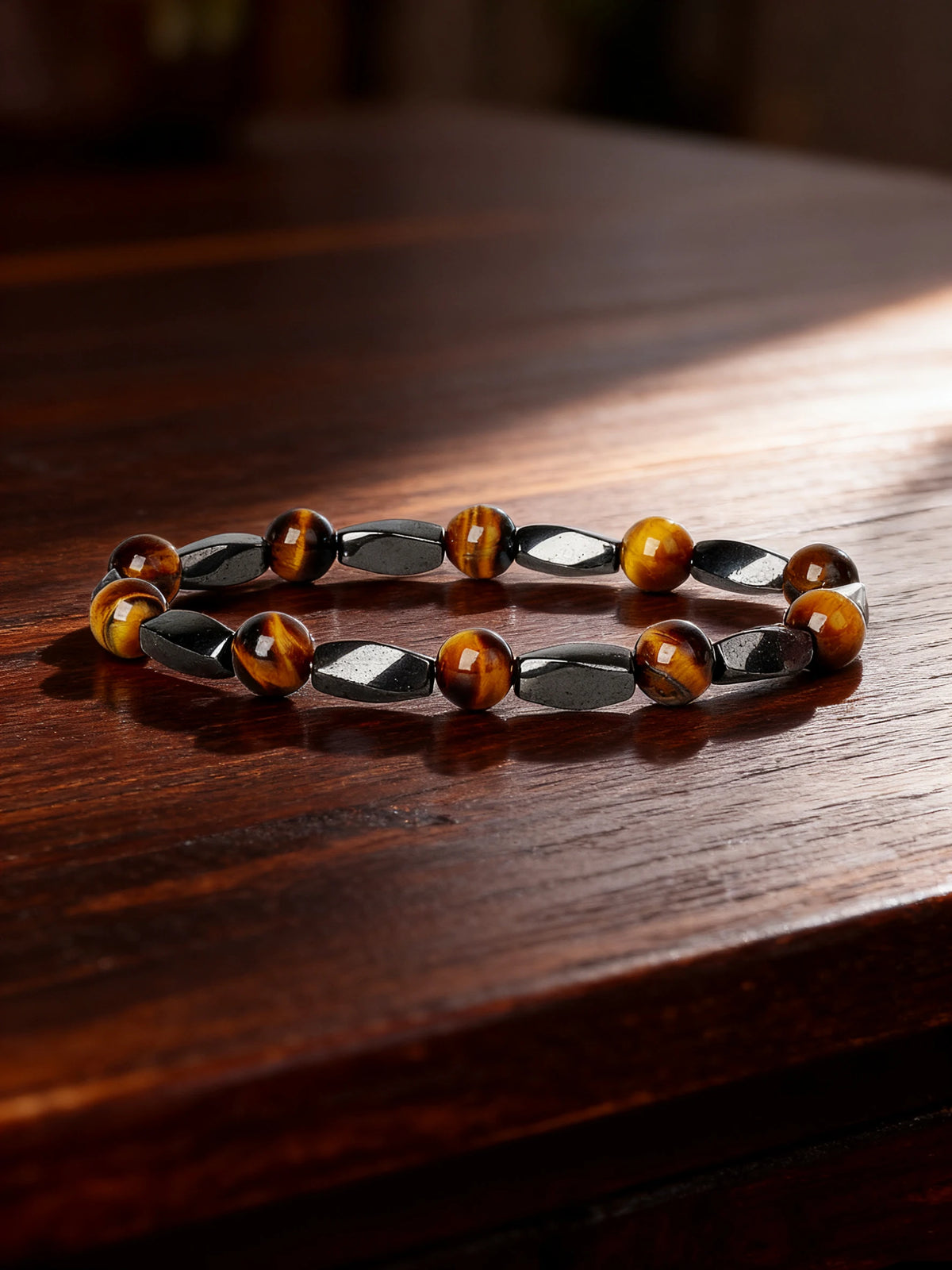Rectangle hematite stone bracelet with natural dark gray beads, 19cm length, designed by Corporación Turística.