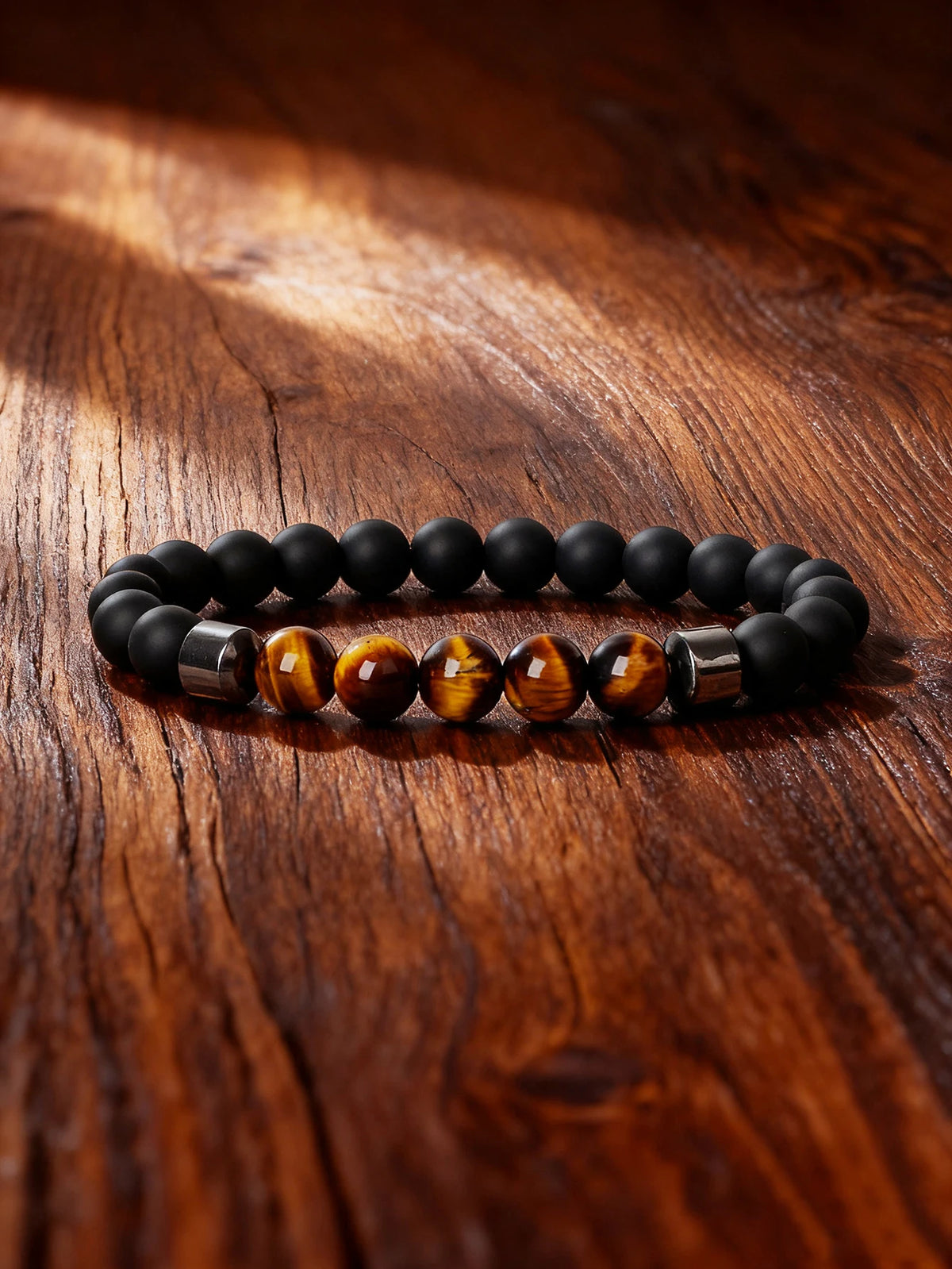 Hematite bracelet with rectangular natural stone beads on a stretch band, 19cm (7.5 inches) long, by Corporación Turística.