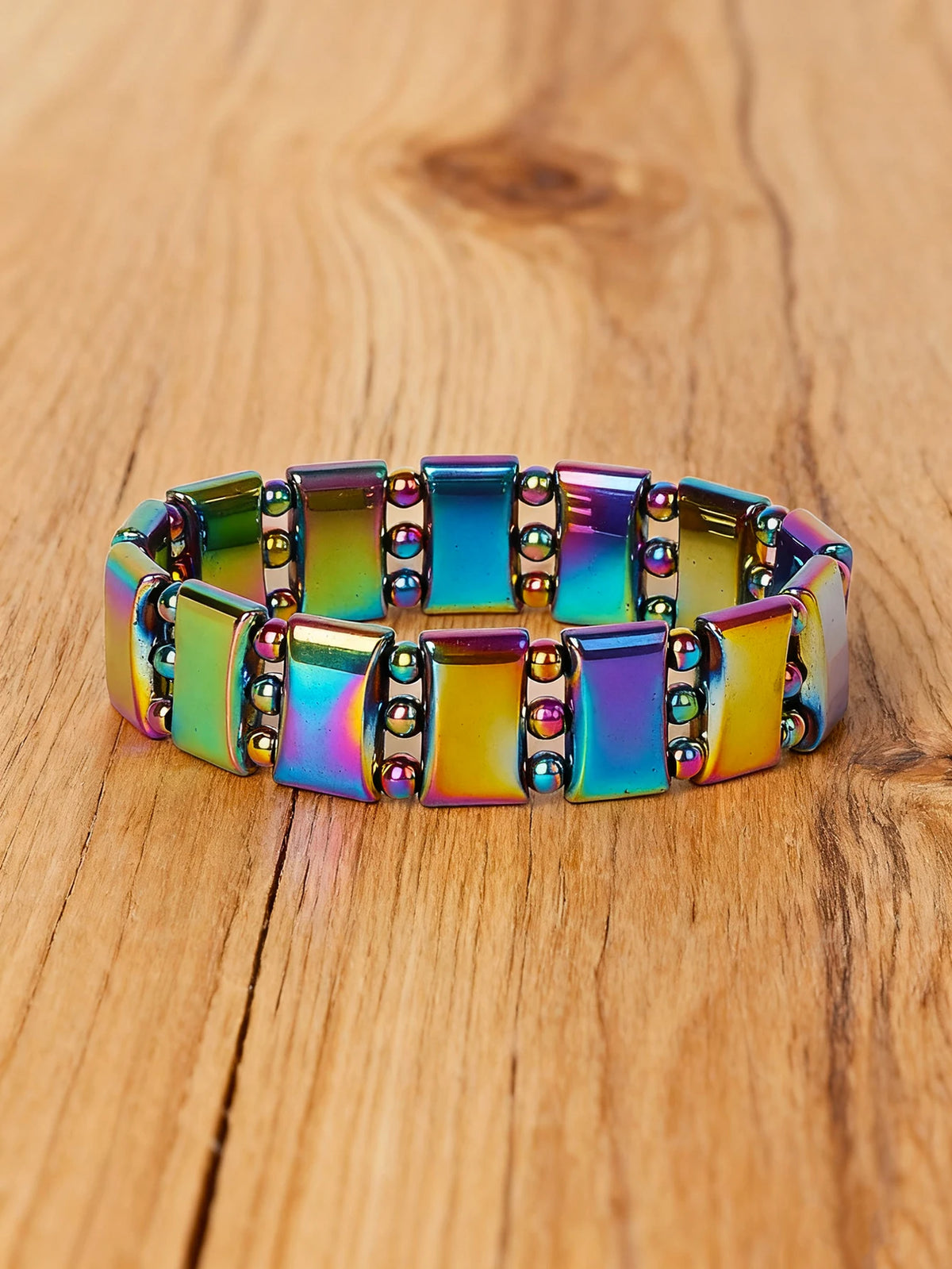 Natural hematite stone bracelet with rectangular beads, 19cm length, from Corporación Turística, featuring black metallic finish.