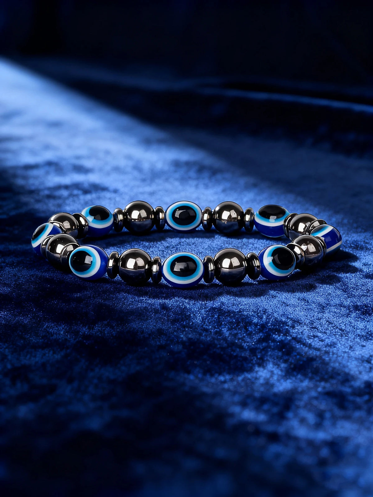 Hematite gemstone bracelet with rectangular natural stone beads, 19cm length, featuring sleek black metallic finish.