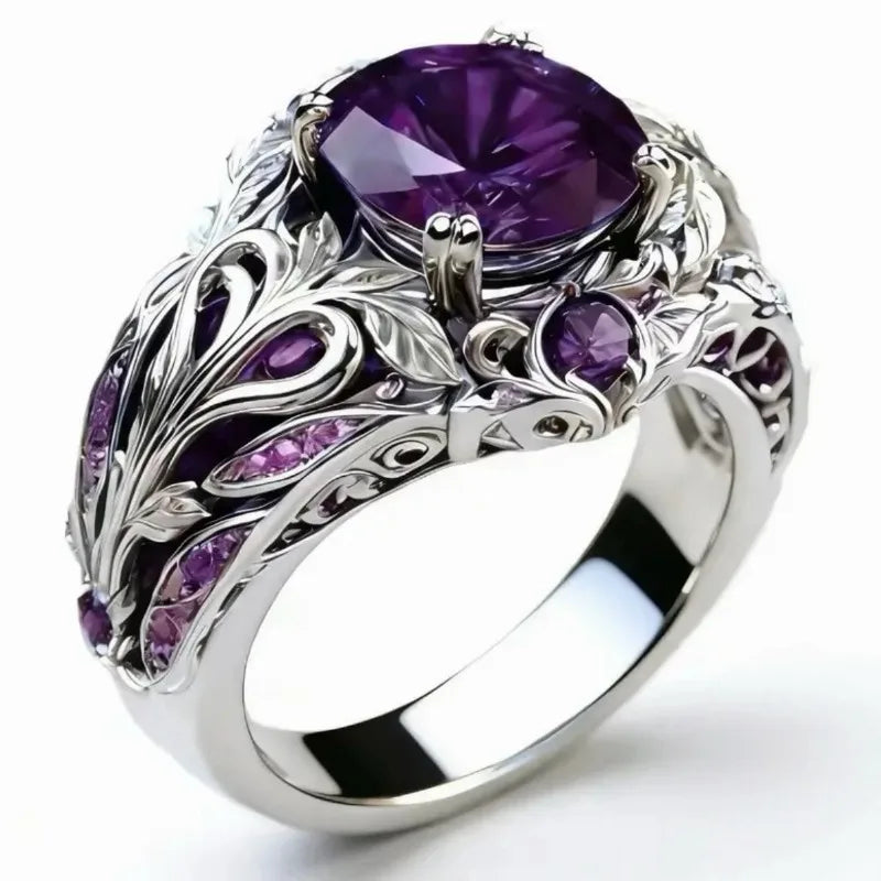 Retro fashion ring by Corporación Turística with sparkling purple cubic zirconia and intricate metalwork design.