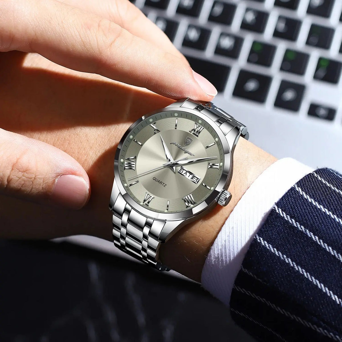 Luxury POEDAGAR men's fashion watch with gold and white dial, featuring a sleek design and stainless steel strap.