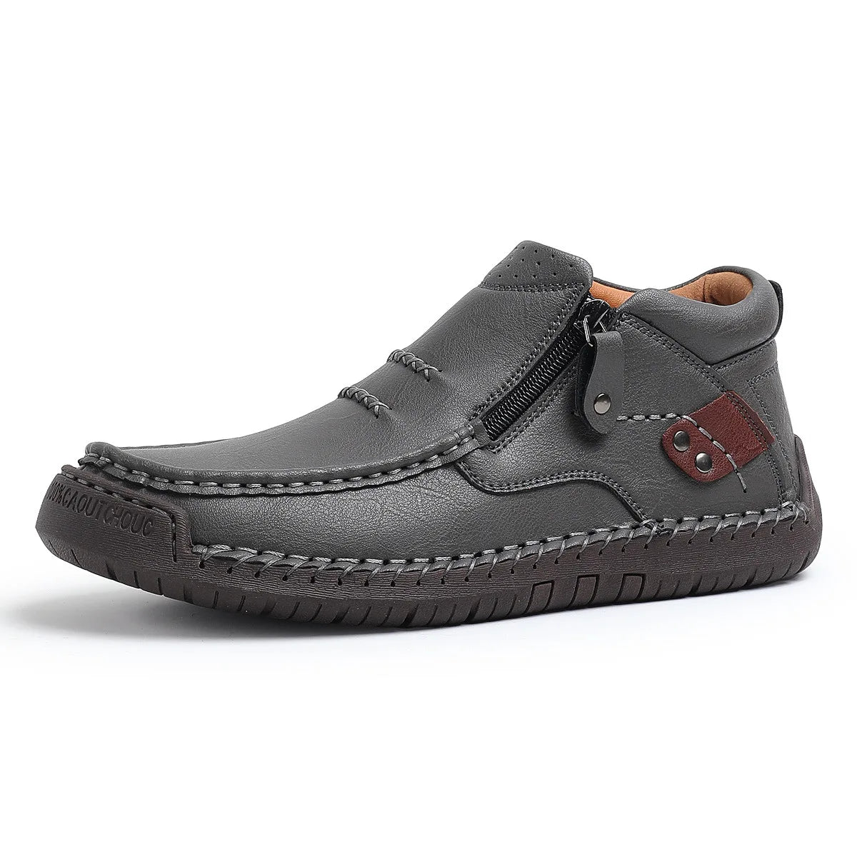 Light brown men's leather classic boots from Corporación Turística, with a sleek design and sturdy soles, perfect for casual wear.