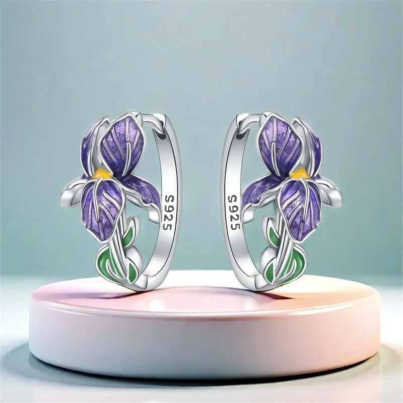 Silver 925 flower-shaped earrings with purple floral design, crafted by Corporación Turística.