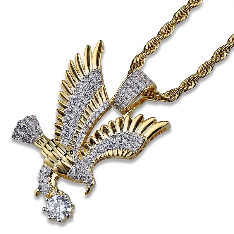 Gold-tone necklace with a detailed flying eagle pendant, featuring intricate design and craftsmanship, perfect for animal-themed jewelry.