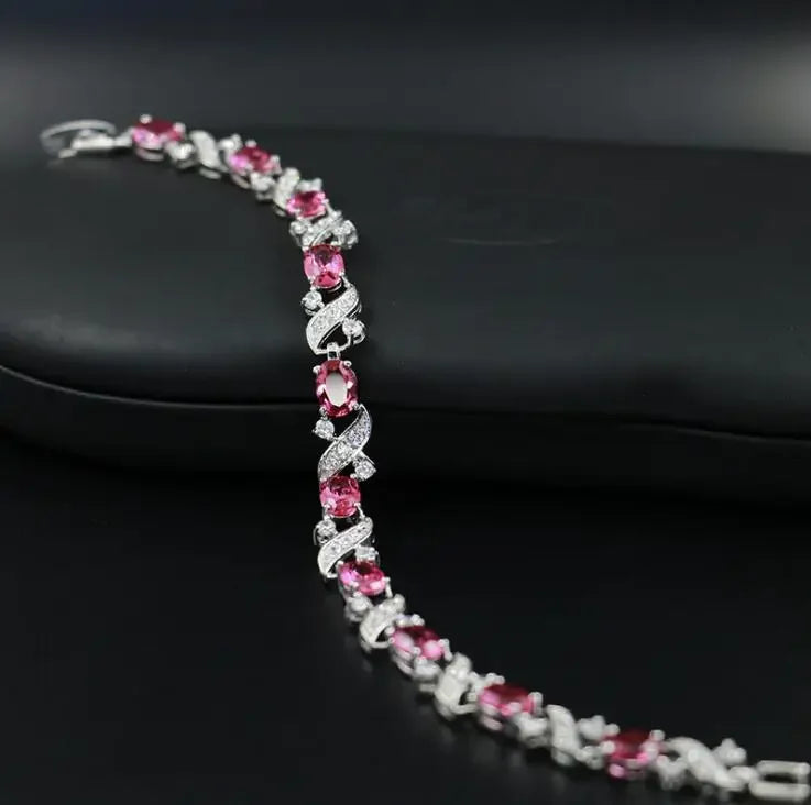 Elegant crystal gemstone bracelet from Corporación Turística featuring colorful, fashionable design with vibrant, shimmering crystals.