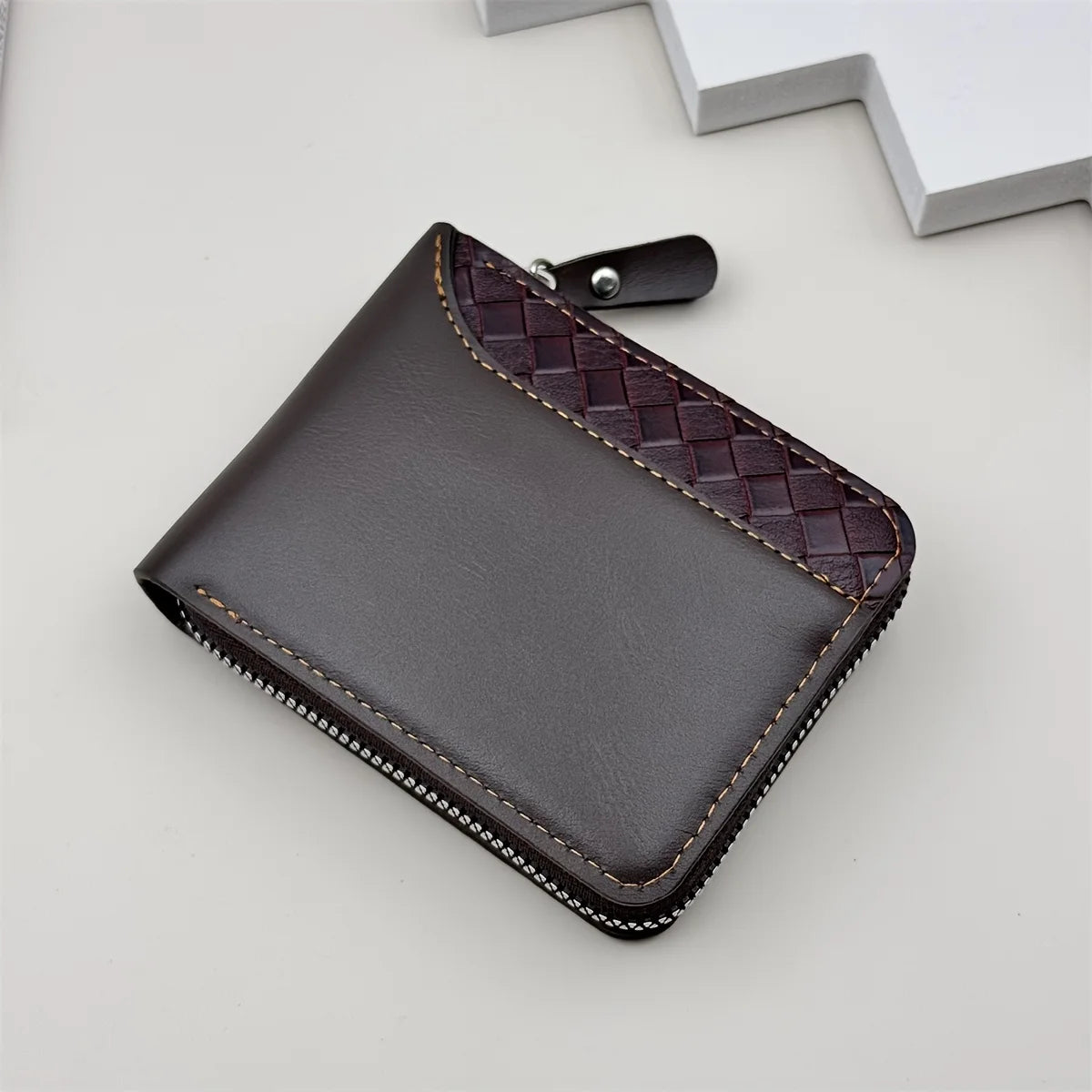 Luxury personalized men's wallet in black synthetic leather with engraved detail, featuring a stylish and durable design.