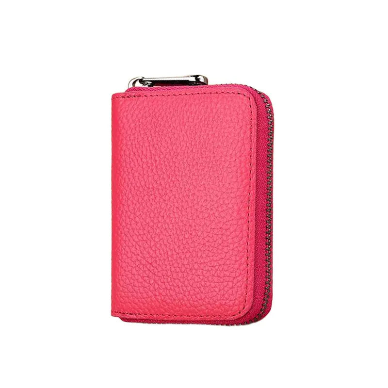 RFID unisex wallet with zipper and cardholder, compact black leather accessory by Corporación Turística, showing front and interior.