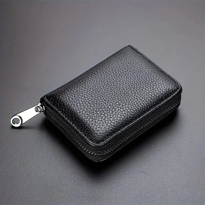 Black RFID unisex wallet with zipper and card holder, compact and elegant design by Corporación Turística.