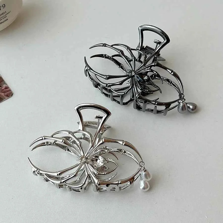 Gothic pearl spider hair clip from Corporación Turística, stylish accessory for elegant and edgy hair styling.