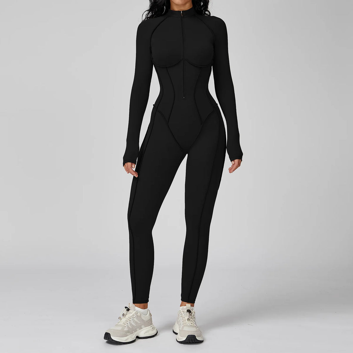 Black women's yoga bodysuit by Corporación Turística featuring high elasticity and a sleek, form-fitting design for active wear.