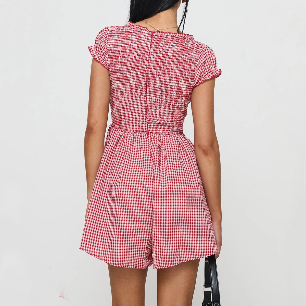Yellow plaid summer romper for women, short mini dress from Corporación Turística, casual and stylish for warm weather.
