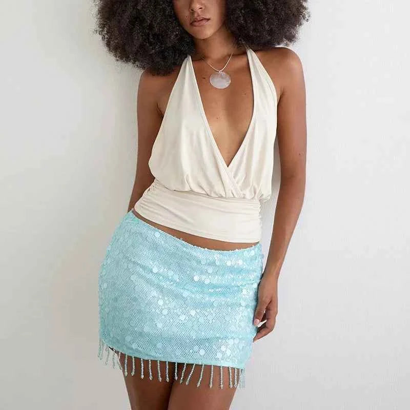 Brillante yellow sequin mini skirt for women, slim fit, shiny party wear from Corporación Turística, shown on a mannequin.