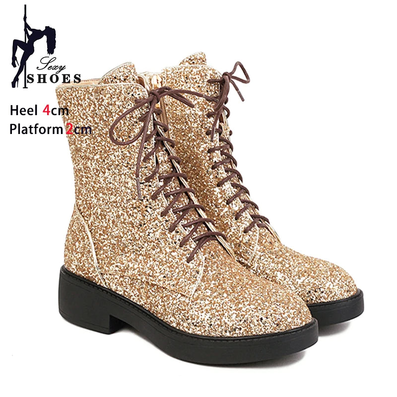Bright, shiny women's short boots from Corporación Turística, casual footwear with a sleek, polished finish.