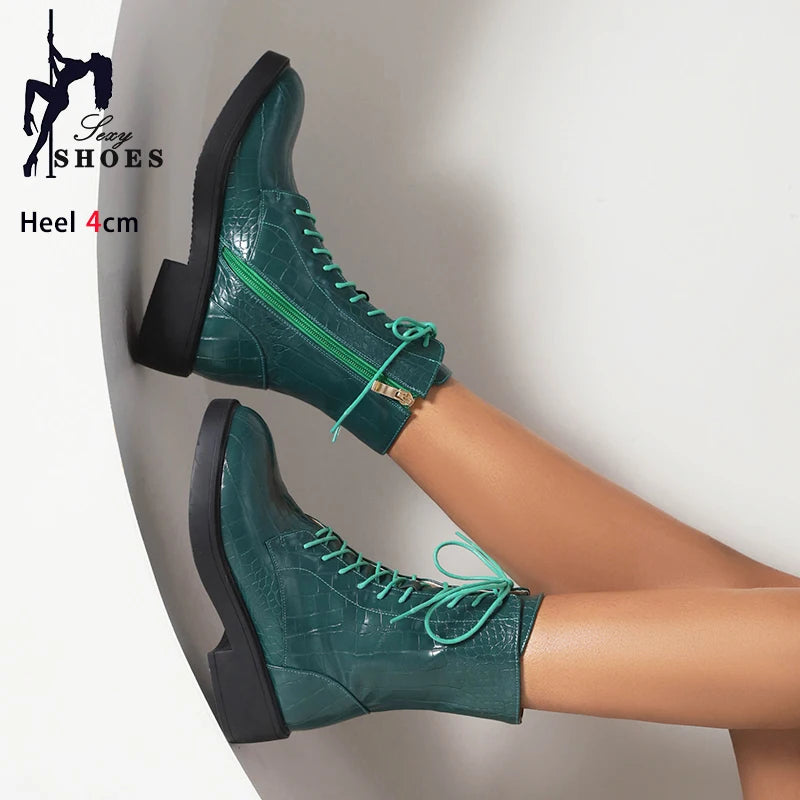 Women's fashion boots with side zipper from Corporación Turística, featuring a stylish design and ankle-length silhouette.