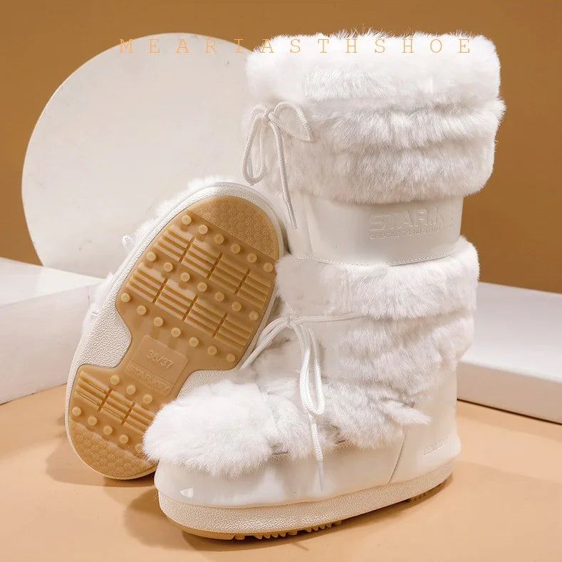 Women's snow boots with thick synthetic leather soles, featuring a stylish and warm design ideal for winter outdoor wear.
