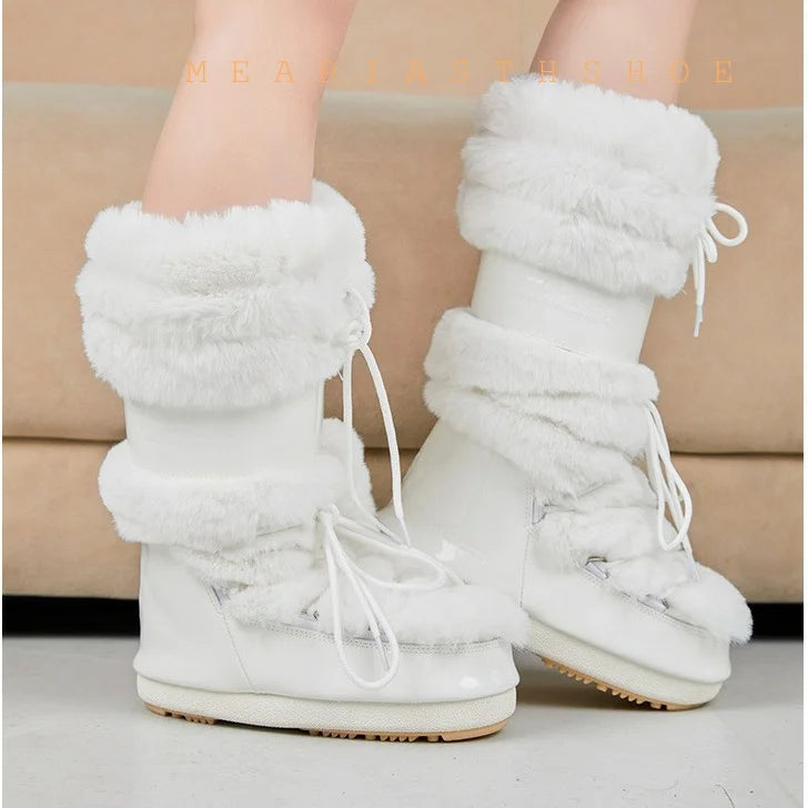 Women's snow boots with thick synthetic leather soles, stylish and warm footwear by Corporación Turística.