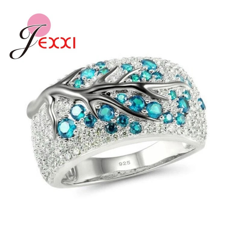 Blue floral plum blossom letter rings by Corporación Turística, featuring intricate designs and vibrant colors.