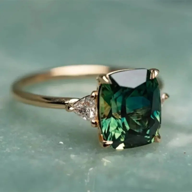 14K gold ring with a natural blue sapphire for women, featuring a sleek design and elegant craftsmanship.