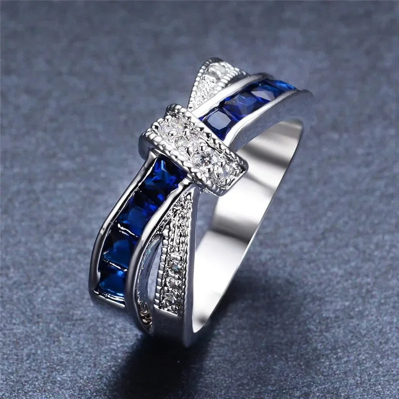 Wholesale sterling silver 925 ring featuring a beautiful sky blue design, showcasing intricate craftsmanship and elegant style.