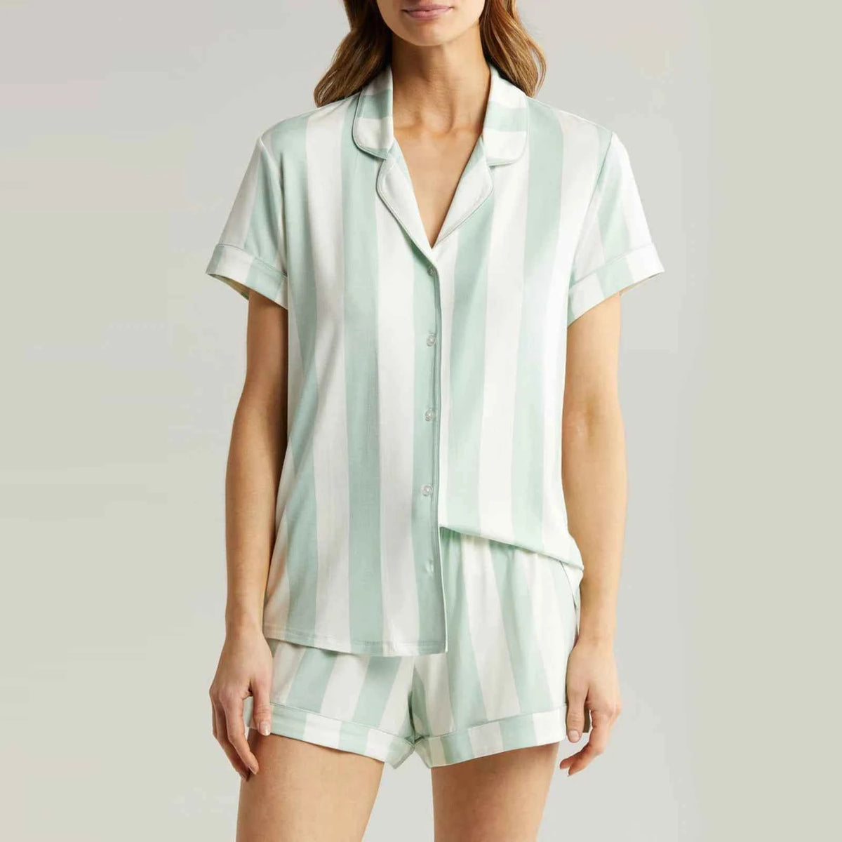 Light blue short-sleeve women's pajama set by Corporación Turística, featuring comfortable fabric and relaxed fit.