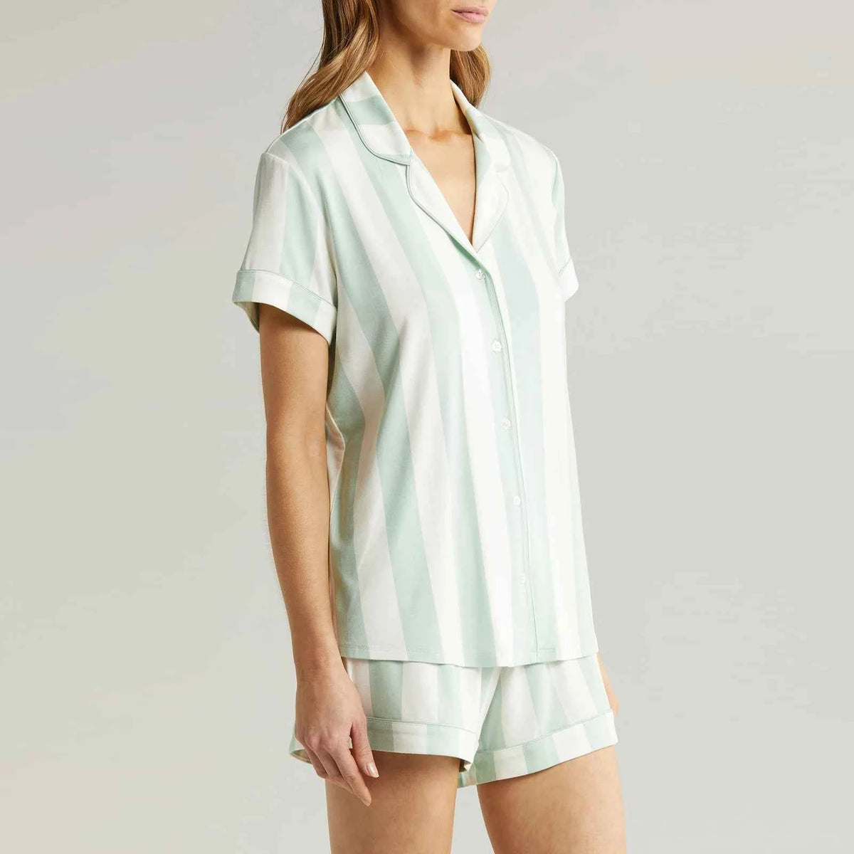 Light blue short-sleeve women's pajama set from Corporación Turística, comfortable and stylish sleepwear for women.
