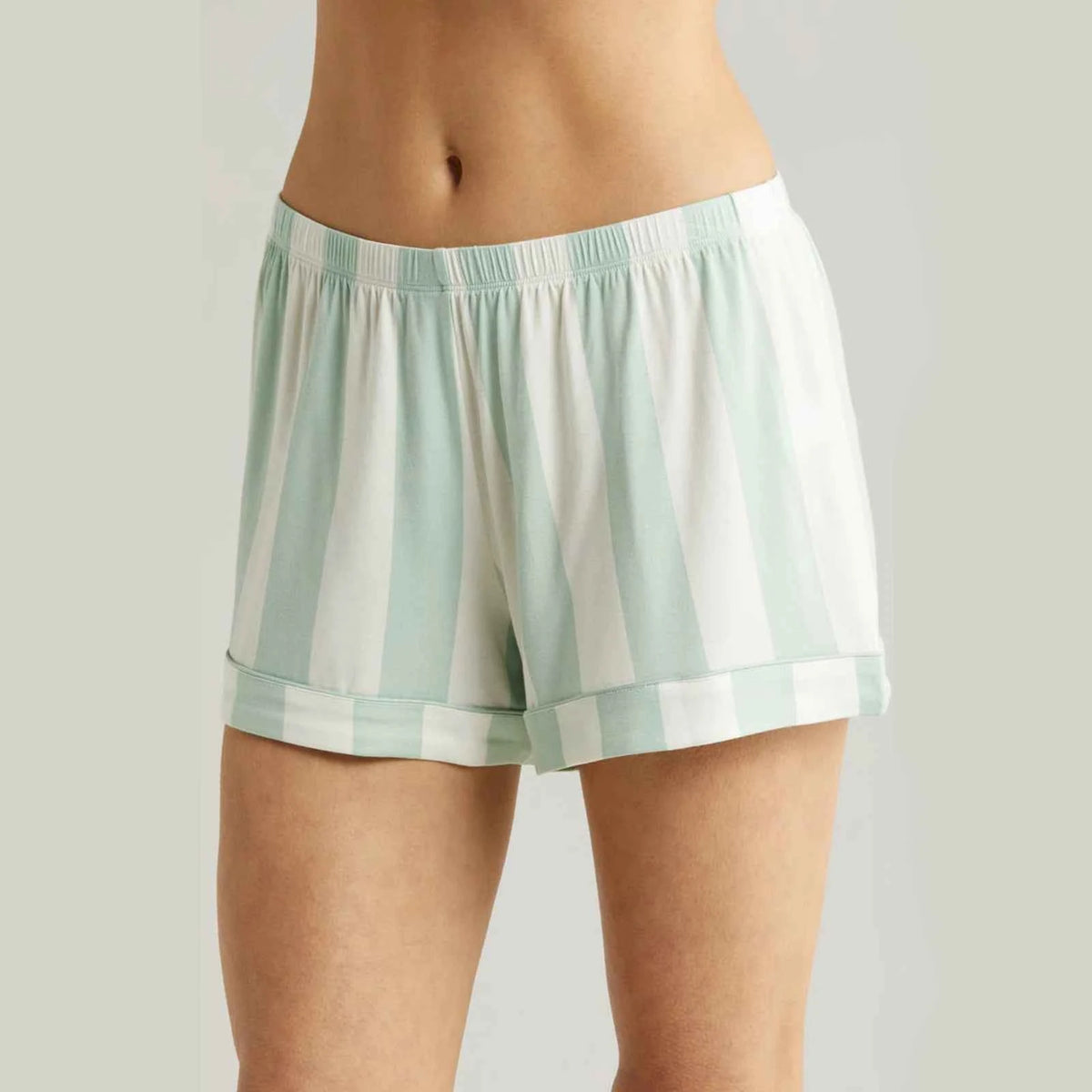 Light blue short-sleeve women's pajama set by Corporación Turística, soft fabric, comfortable sleepwear for women.