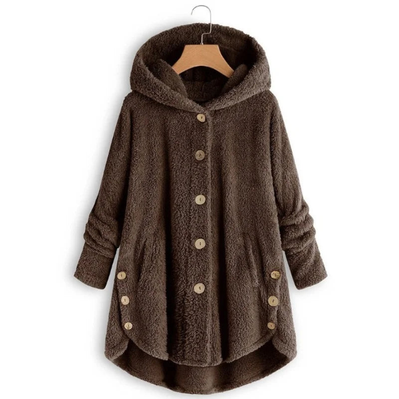 Light blue long-sleeve winter coat with buttons, stylish autumn and winter outerwear by Corporación Turística.