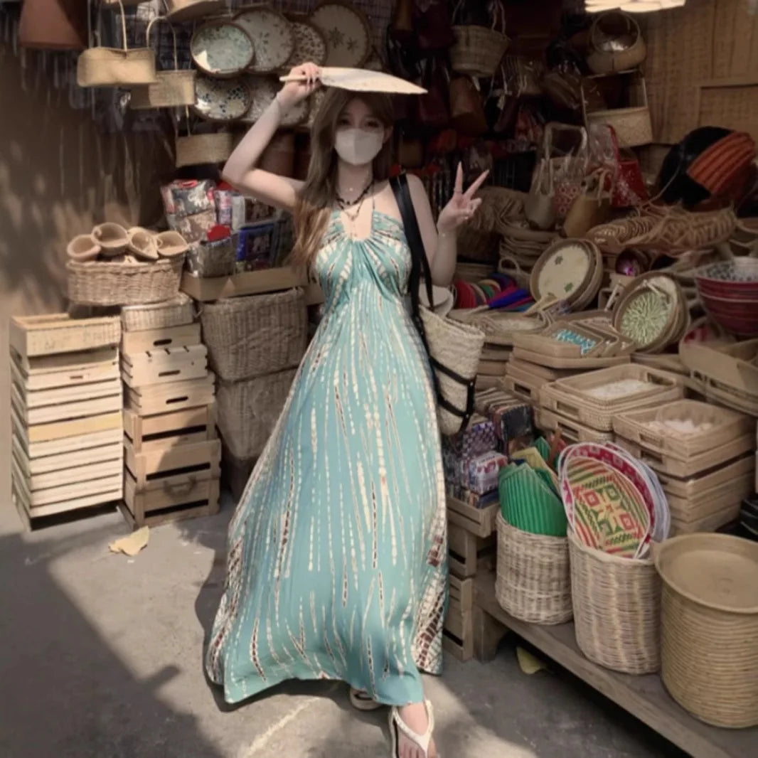 Light blue bohemian summer dress for women by Corporación Turística, featuring a flowing style and casual, breezy design.